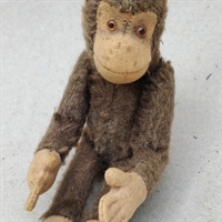 mellembrun-abekat-lyse-poter-hoved-bevægelige-arme-ben-gammelt-krammedyr-legetøj